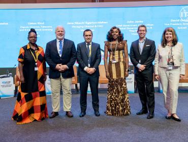 The image shows BEREC Vice-Chair Kostas Masselos with other speakers at the ITU GSR-24 in Kampala, Uganda